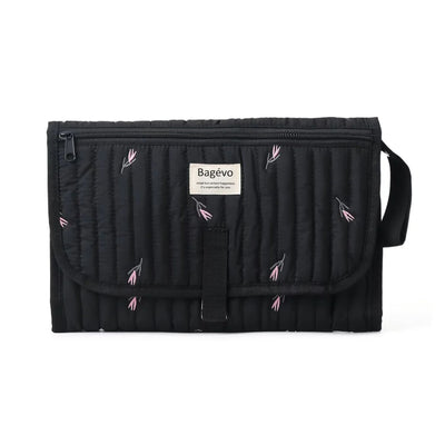 Quilted portable baby changing mat and travel clutch folded in minimalist floral Black tulip print - Available from Senso-Blanky