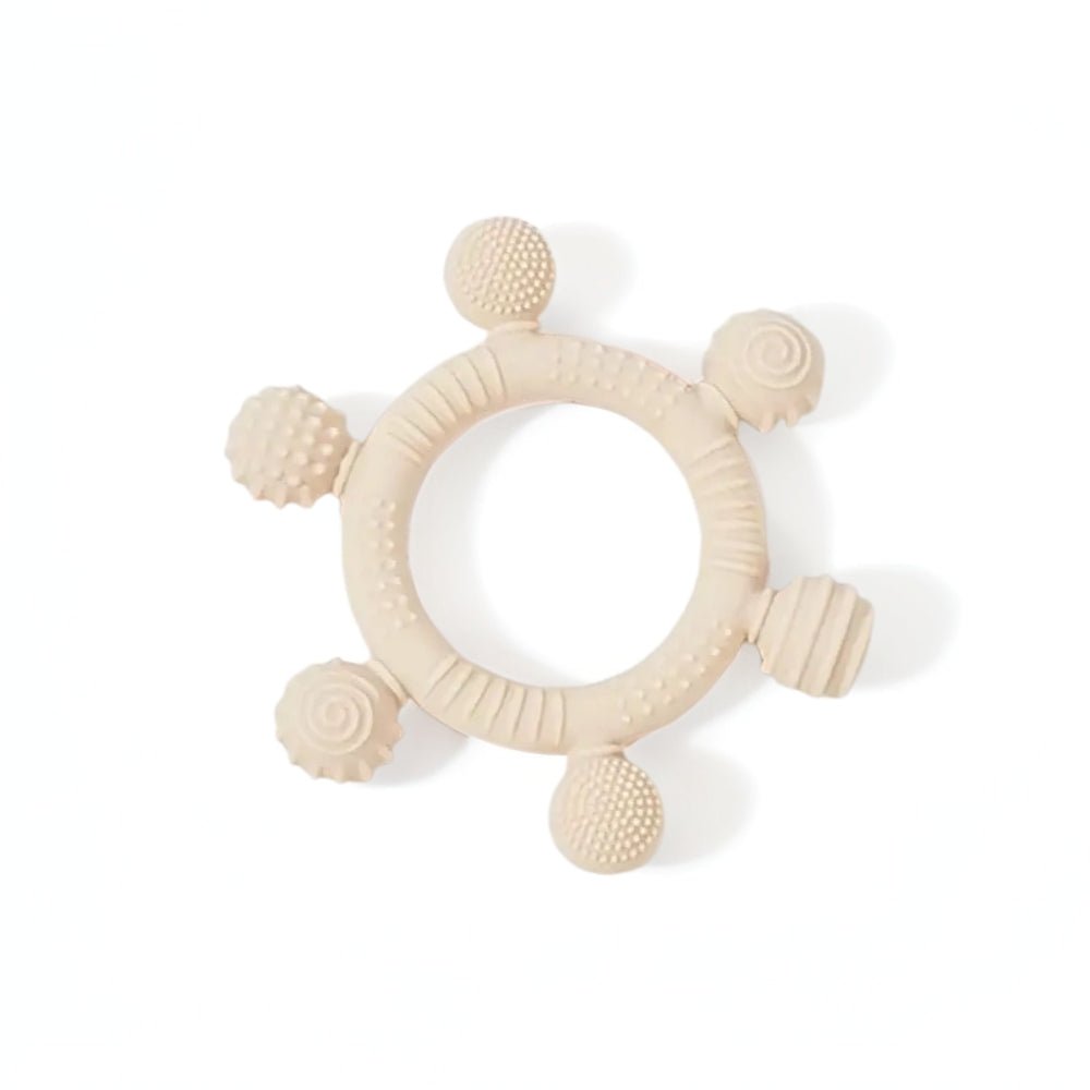 6-Ball silicone sensory teether ring and infant gum soother in beige for babies 3 months and older, showing multiple unique textures.
