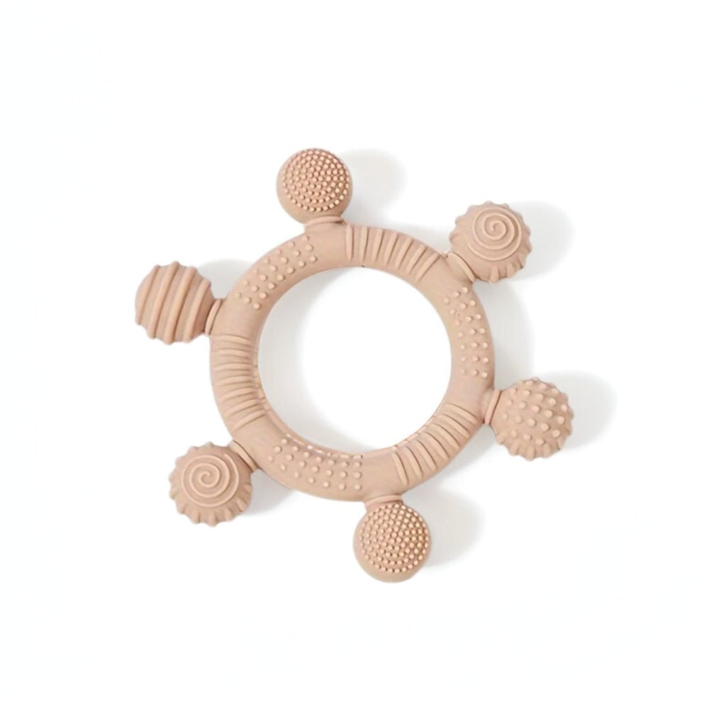6-Ball silicone sensory teether ring and infant gum soother in toffee for babies 3 months and older, showing multiple unique textures.
