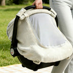 Breathable Beige muslin baby car seat cover with mesh window on infant carrier on Car Seat - Available from Senso-Blanky