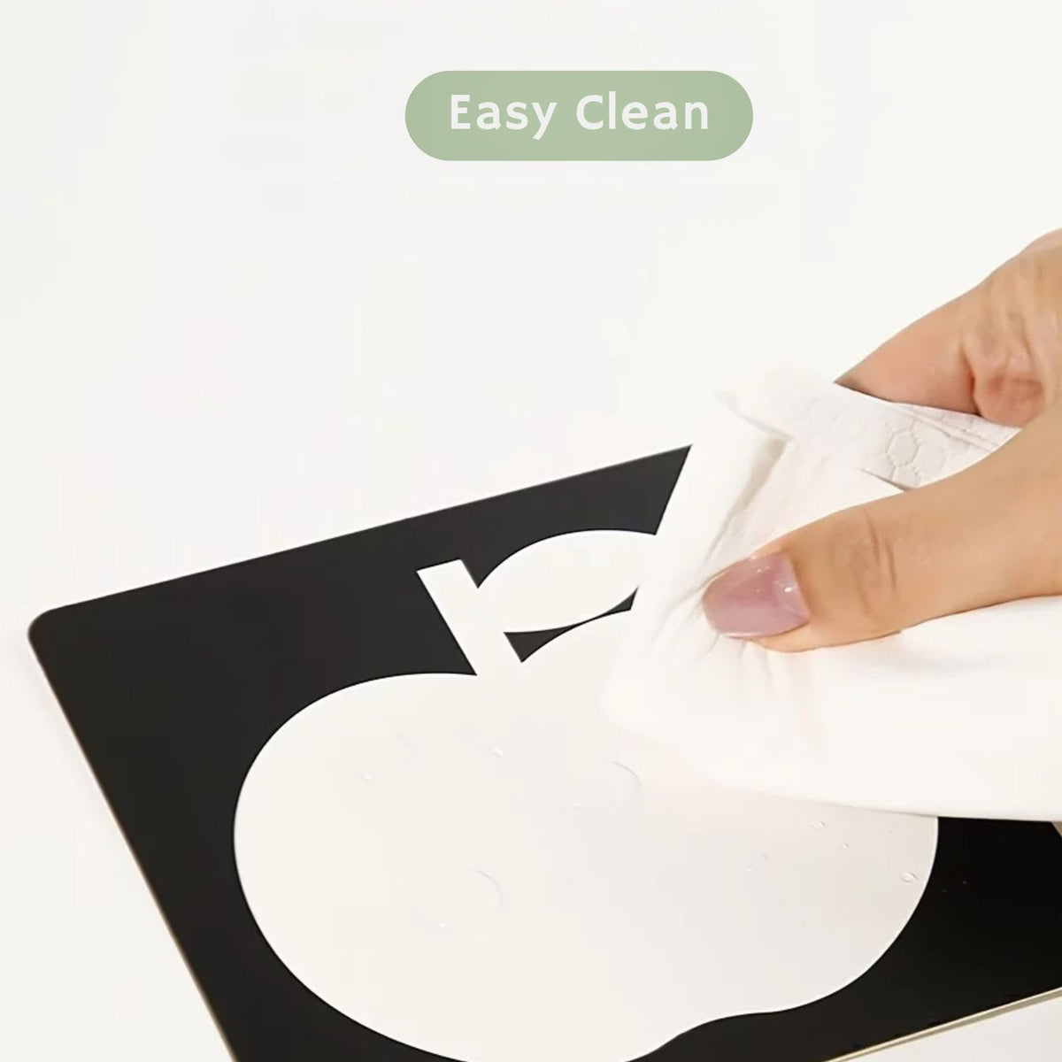 Showing easy cleaning of High-Contrast Newborn Vision and Tummy Time Cards  for 1 to 3 month old babies,  available from Senso-Blanky