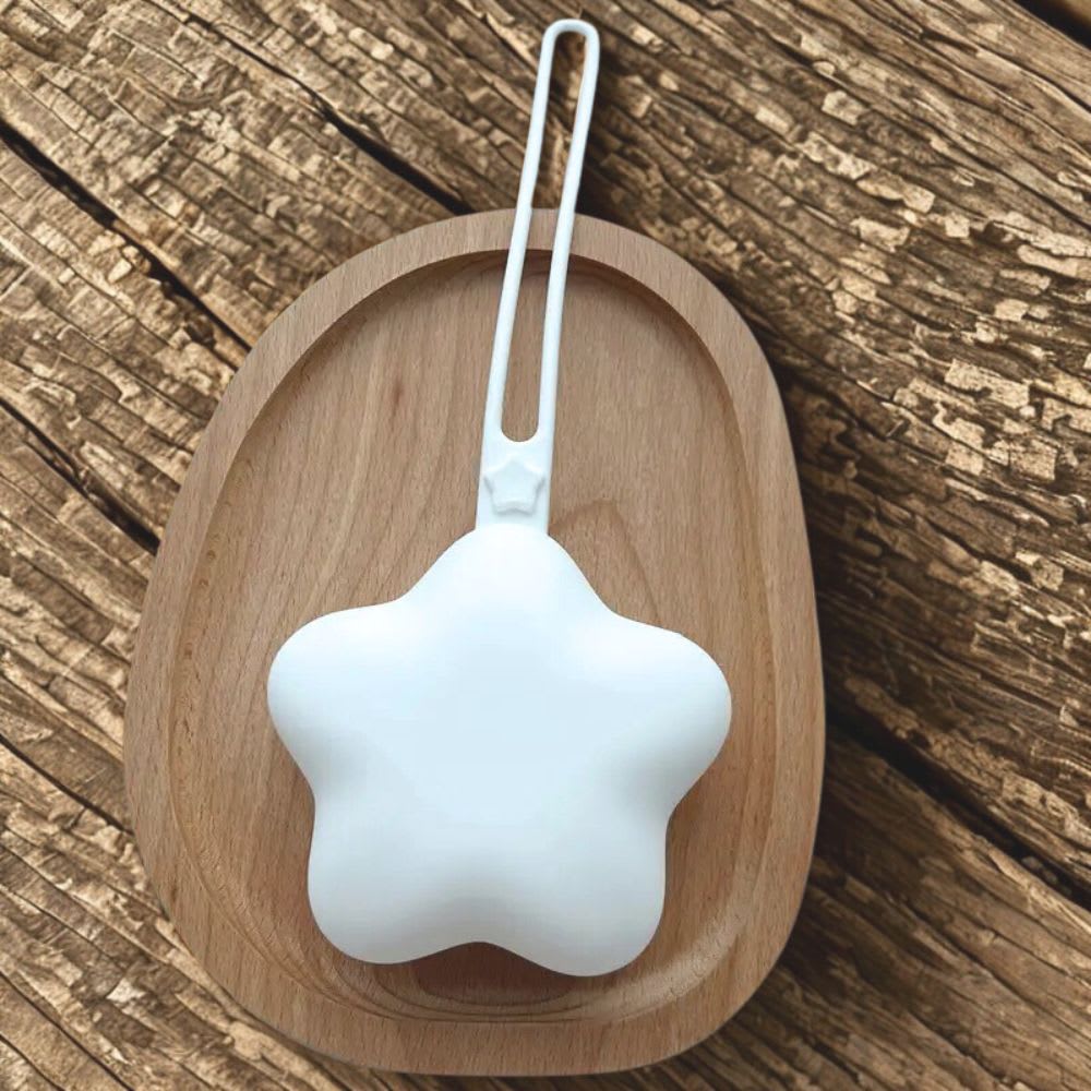 White star silicone dummy case  and wood surface available from Senso-Blanky