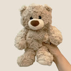 Soft Plush Teddy Bear in Biscuit Brown being held up available from Senso-Blanky