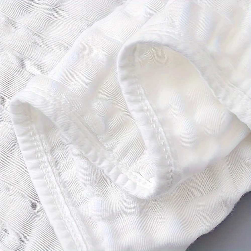 Ultra - Absorbent Muslin Burp Cloth closeup | 4 - Pack Essential Bundle White - Baby Care Essentials from Senso - Blanky