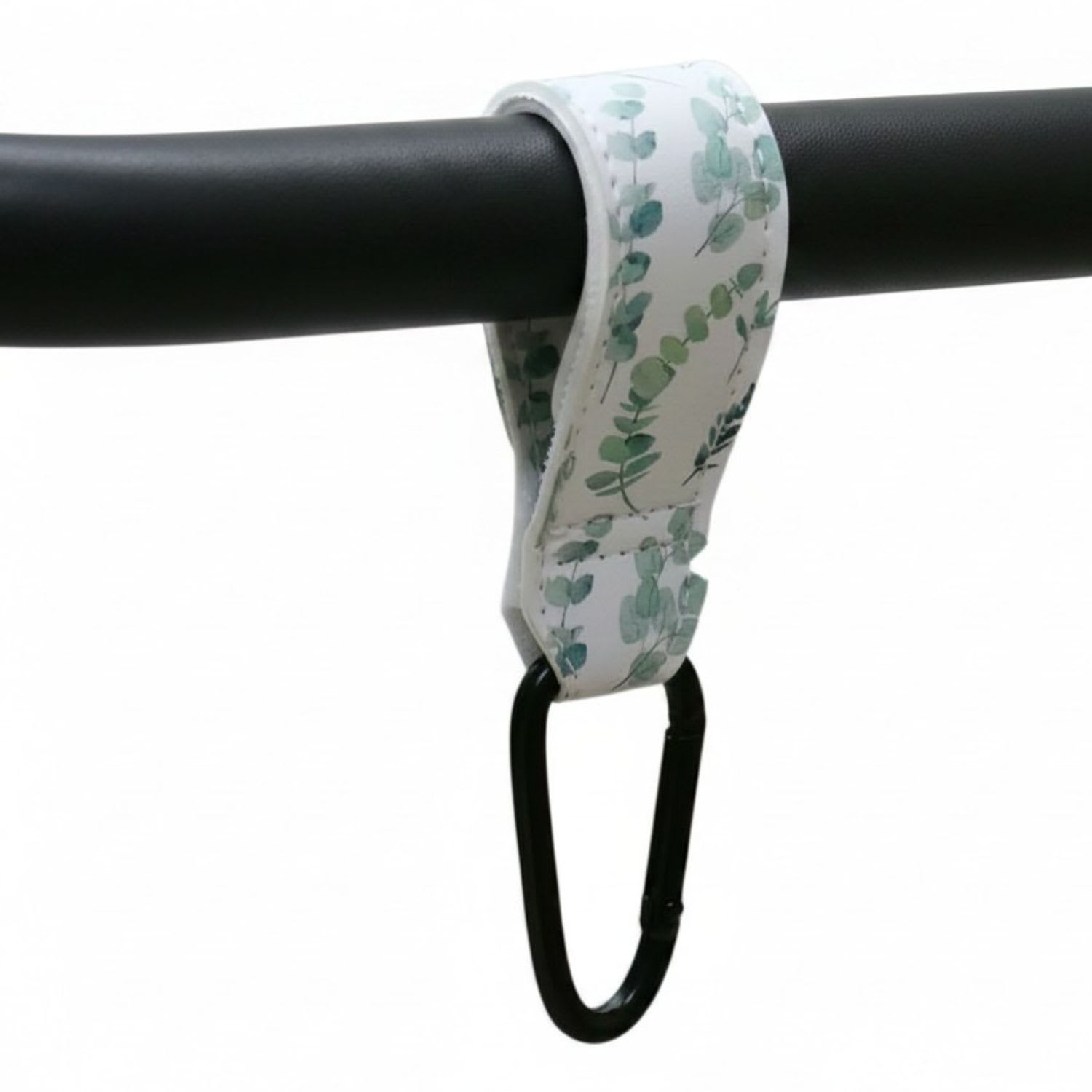 Close-up of durable Green Leaves printed adjustable Velcro strap and heavy-duty metal carabiner clip for stroller - Available from Senso-Blanky
